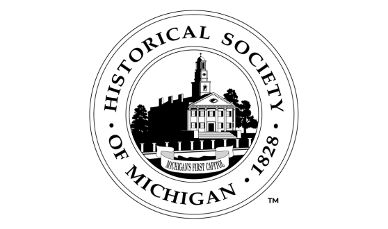 Image of old building with text Michigan's First Capitol inside a circle with text Historical Society of Michigan 1828