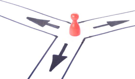 Red pawn on a junction of three paths with arrows leading each way