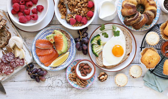 Variety of brunch foods set out on a table