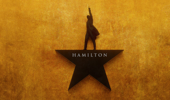 Man standing on top of a star with text Hamilton